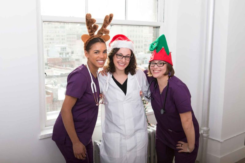 female medical residents dressed in chrsitmas costumes resident gift guide